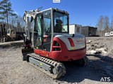 2021 Takeuchi TB370 crawler excavator, rear three-quarter view