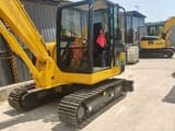 2022 Komatsu PC56 crawler excavator, side view