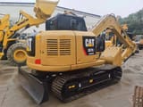 2018 Caterpillar 307E2 mini excavator rear three-quarter view