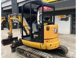 2021 Caterpillar 302.7DCR crawler excavator, rear three-quarter view