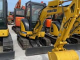 2020 Komatsu PC30MR-3 mini excavator, front three-quarter view