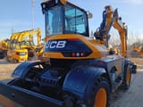 2024 JCB HYDRADIG 110W wheel excavator, rear three-quarter view