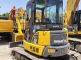 2018 Komatsu PC-55MR mini excavator, rear three-quarter view