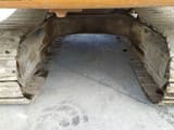 2003 Kobelco E 235 crawler excavator undercarriage view