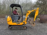 2011 JCB 8014 mini excavator, side view