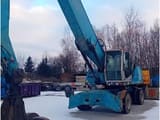 2010 Fuchs MHL350 material handler, front three-quarter view