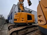 2023 Liebherr R926 Compact Litronic mini excavator, rear three-quarter view