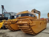 2020 Caterpillar 320C amphibious excavator, rear three-quarter view