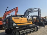 2026 Hyundai HX220L crawler excavator, rear three-quarter view