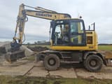 2017 Komatsu PW148-10 wheel excavator, side view