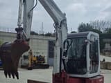 2007 Takeuchi TB153 mini excavator, front three-quarter view