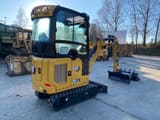 2023 Caterpillar 301.8 mini excavator, rear three-quarter view