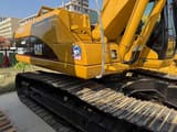 2026 Caterpillar 320C crawler excavator, side view of engine compartment
