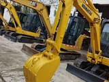 2023 Komatsu PC35MR-2 mini excavator, front three-quarter view