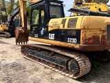 Caterpillar 323D crawler excavator, rear three-quarter view