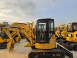 2021 Caterpillar 303.5E mini excavator, side profile view