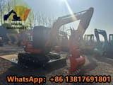 2024 Kubota KX057-4 mini excavator, side view