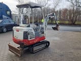 2009 Takeuchi TB014 mini excavator, rear three-quarter view
