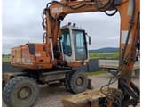 2001 Atlas 1404K wheel excavator, side view