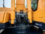 Hyundai 220-9S crawler excavator boom cylinders close-up