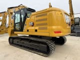 2024 Caterpillar 320E crawler excavator, rear three-quarter view