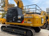 2024 Caterpillar 323DL crawler excavator, rear three-quarter view