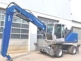 2016 Fuchs MHL320F material handler side view