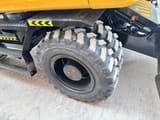 2023 Caterpillar 315D wheel excavator dual tire detail