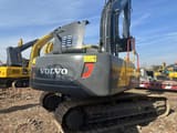 Volvo EC290 crawler excavator, rear three-quarter view