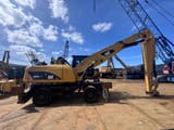 2011 Caterpillar M322D MH material handler side view