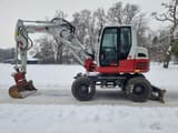2019 Takeuchi TB295W wheel excavator, side view
