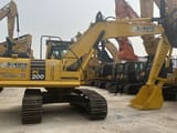 2023 Komatsu PC200 crawler excavator, side profile view
