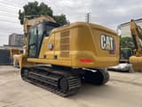 2022 Caterpillar 320GC crawler excavator, rear three-quarter view