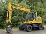 2011 Komatsu PW148 wheel excavator, side profile view