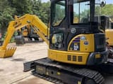2022 Komatsu PC55MR-2 mini excavator, three-quarter view