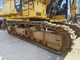 2023 Caterpillar 374F L crawler excavator side view of tracks