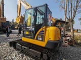 2024 Komatsu PC56 excavator, rear three-quarter view