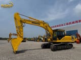 Komatsu PC300-8M0 crawler excavator, side profile view