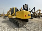 2023 Komatsu PC240 LC crawler excavator, rear three-quarter view