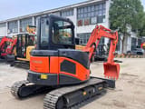 2023 Hitachi ZX50 mini excavator, rear three-quarter view