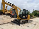 2022 Caterpillar 306E mini excavator, front three-quarter view