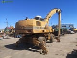 2001 CASE 1188 P wheel excavator, rear three-quarter view