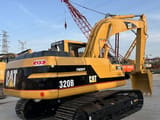 Caterpillar 320B crawler excavator, rear three-quarter view