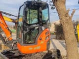 Kubota U-30 mini excavator, side view
