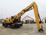 2008 Caterpillar M322D material handler, side view