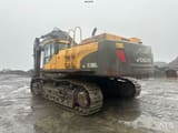 2012 Volvo EC700CL crawler excavator, rear three-quarter view