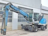 2016 Fuchs MHL320D material handler, side view