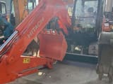 Hitachi ZX60 mini excavator, front three-quarter view