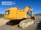 2015 Caterpillar 390F crawler excavator, rear three-quarter view