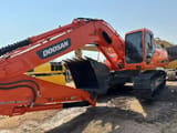 2024 Doosan DX300 crawler excavator, side profile view